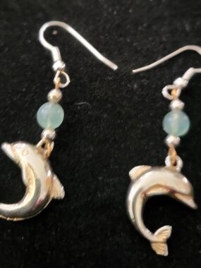 Silver Dolphin Drop Earrings with Pale Green Beads